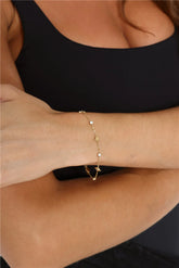 Gold Star Charm Bracelet with Sparkling Diamantes for Festive Glamour