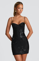 Black Lace-Up Mini Dress with Floral Appliqué for a Striking Silhouette