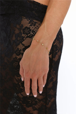 Gold Star Charm Bracelet with Sparkling Diamantes for Festive Glamour