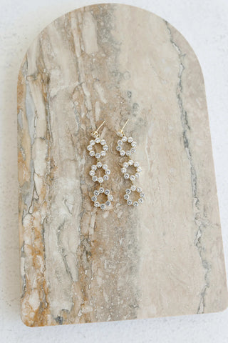 Shimmering Gold Dangle Earrings with Dazzling Diamante Details