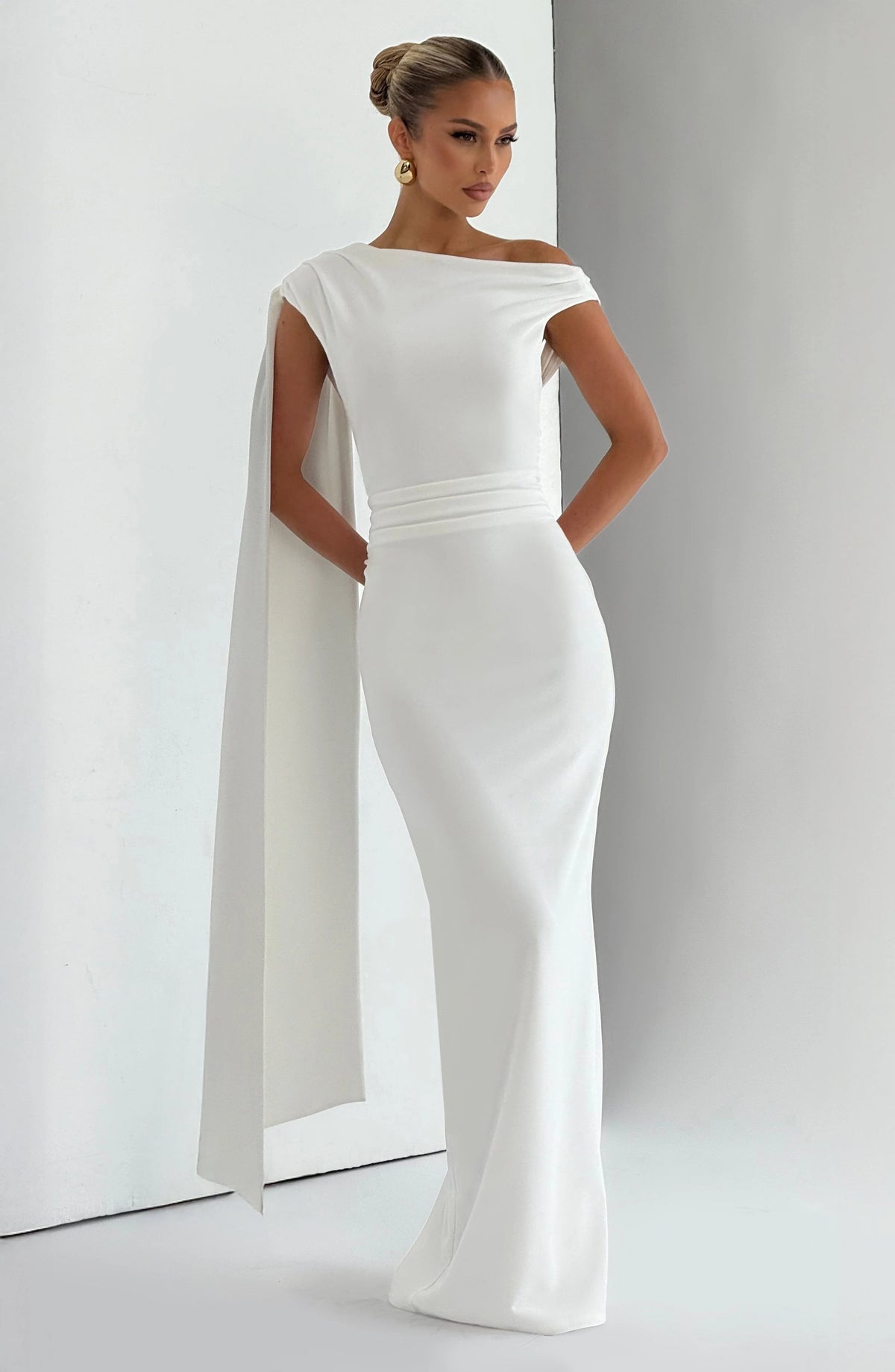 Elegant Ivory Maxi Dress with Asymmetric Pleating and Back Split